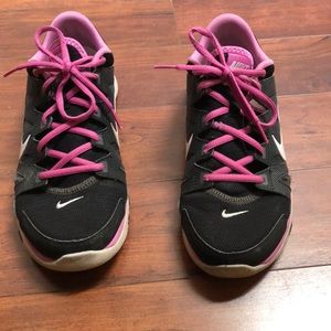 Black and pink women’s Nike shoes